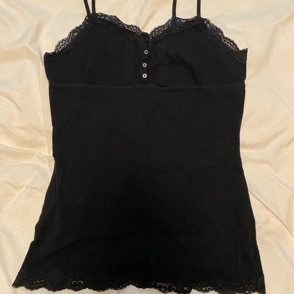 Size L. Fitted, fits like M/L.